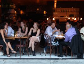 Interior photo of The Smith East Village filled with guests