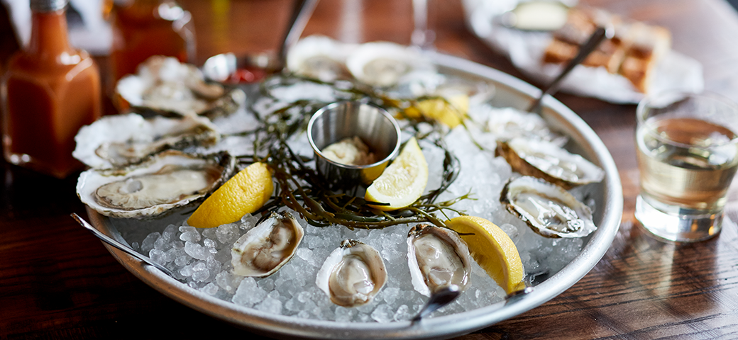 Background photo of oysters on a plate