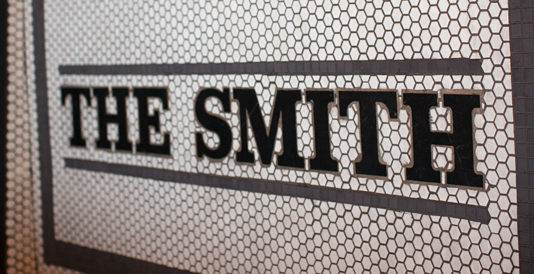 The smith logo on wall created with tiles