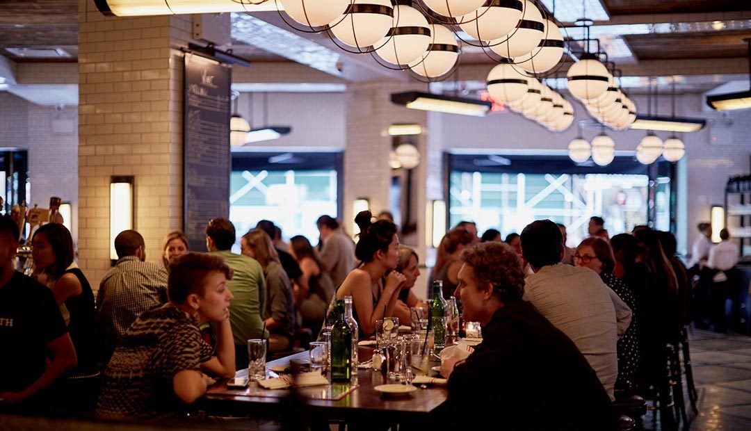 A photo of The Smith NoMad dining room filled with people