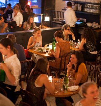A photo of The Smith East Village filled with guests